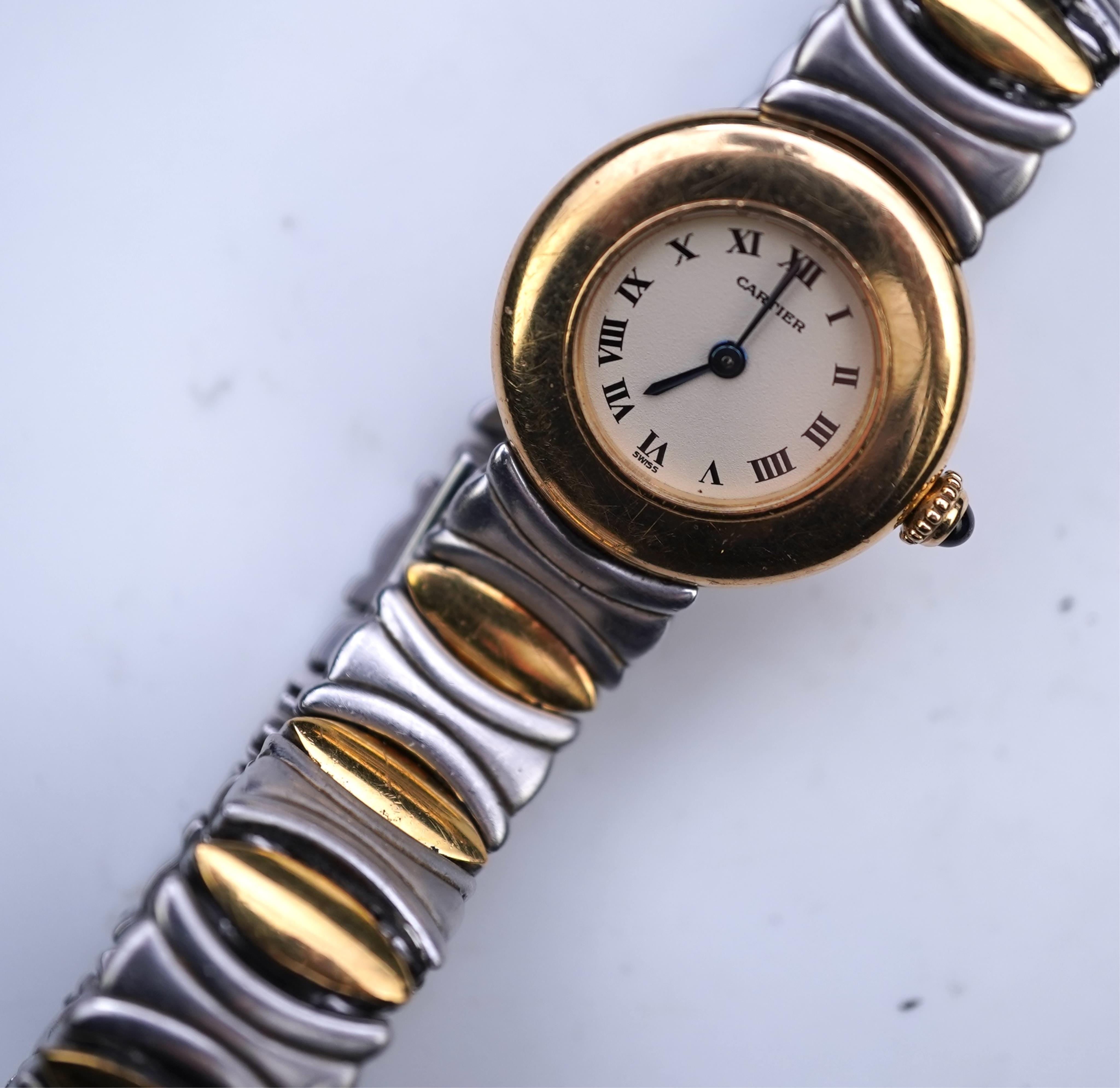 Cartier, a lady's gold and stainless steel wristwatch, 'Colisée', ref.8057908C